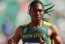 Caster Semenya at a championship podium, representing resilience in global athletics and resistance against discriminatory gender norms.