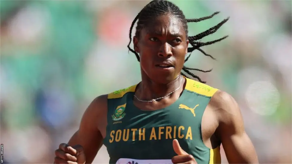 Caster Semenya at a championship podium, representing resilience in global athletics and resistance against discriminatory gender norms.